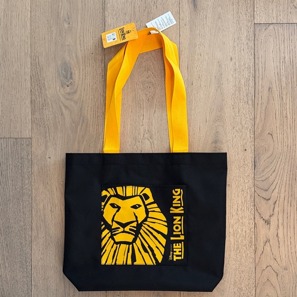 Disney Handbags - The Lion King Black and Yellow Tote Bag NWT